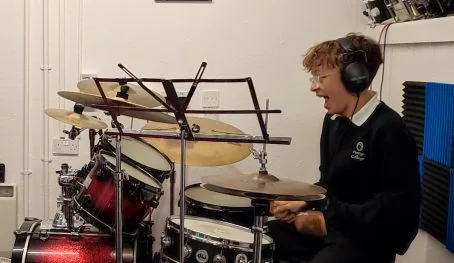 Boy having a drum lesson in Tricks with Sticks studio